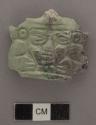 Fragments of carved jadeite heads