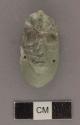 2 fragments of jade round relief human (?) head