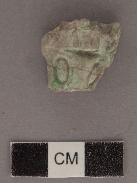 Fragment of jade headdress - round relief