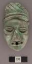 Carved jadeite human face