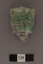 Carved jadeite ornament, human face