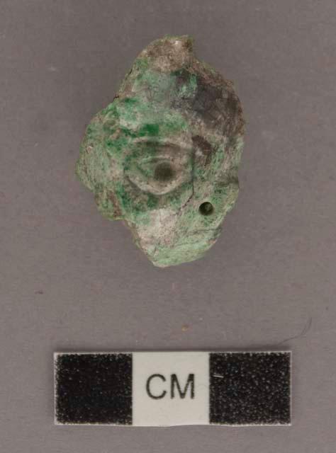 Fragment of jade human head- thickness 21 mm.