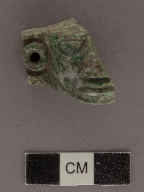 Fragment of jade human head - 21.2x25x20 mm.
