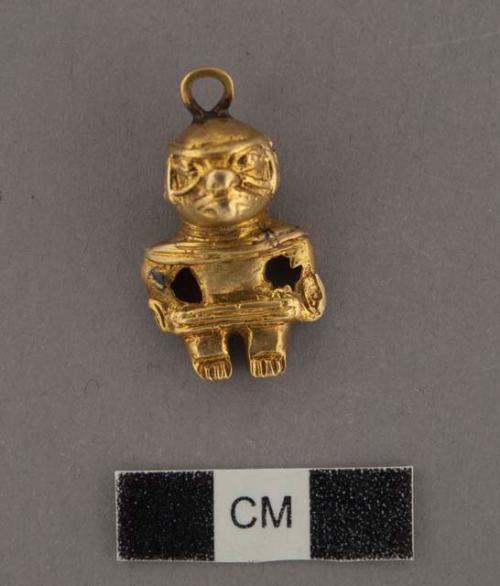 Gold pendant - human figurine