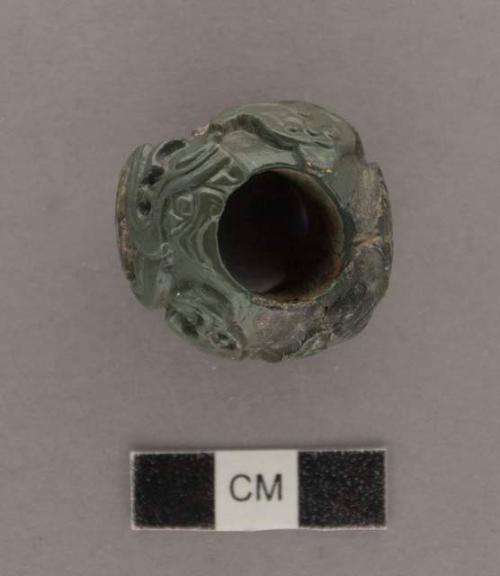 Fragment of carved jadeite bead