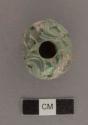 Fragment of carved jadeite bead