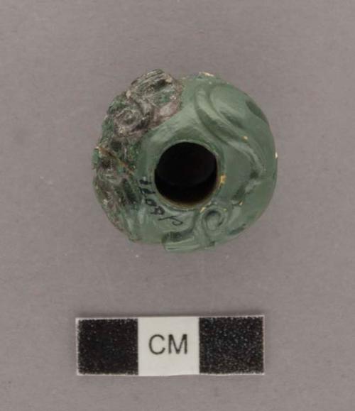 Fragment of carved jadeite bead