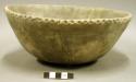 Ceramic complete vessel, mended, incised rim