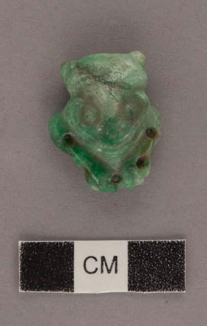 Carved jadeite bead