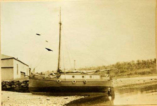 The "Kathleen" docked on shore