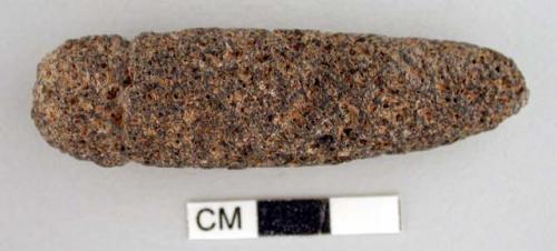 Medicine stone (haury). cylindrical, one end more pointed. horizontal groove ext