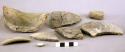 Ceramic rim and body sherds, notched rim, mended, 1 shell fragment