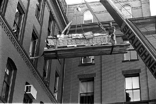 Removal of cast of Stela A from Peabody Museum