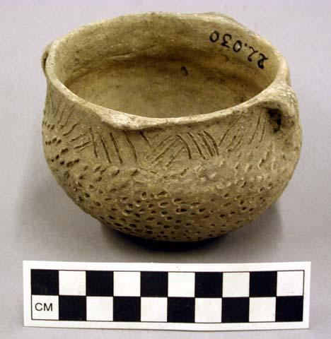 Ceramic jar with 2 lugs and 2 handles, punctate and incised patterns on exterior