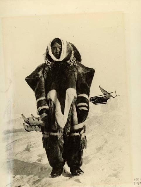 Inuit woman wearing traveling dress