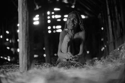 Samuel Putnam negatives, New Guinea. woman looking towards and past the camera