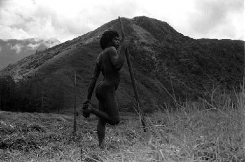 Samuel Putnam negatives, New Guinea. Natorek in Wuperainma; runs towards honai