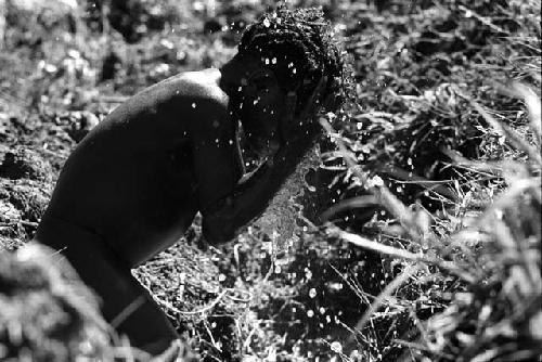 Samuel Putnam negatives, New Guinea.Tukom washing in the little creek