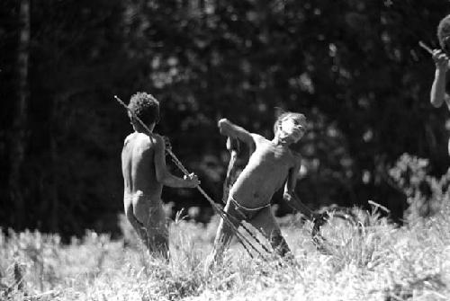 Samuel Putnam negatives, New Guinea.boys playing sikoko wasin