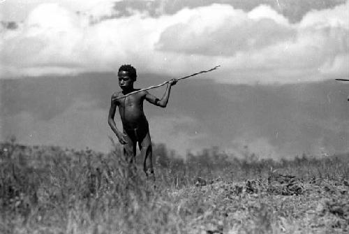 Samuel Putnam negatives, New Guinea. Kousa about ready to throw a spea