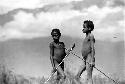 Samuel Putnam negatives, New Guinea. 2 boys waiting for the other team to throw the hoop