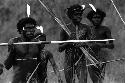 Samuel Putnam negatives, New Guinea; several warriors coming to the front