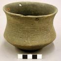 Complete ceramic vessel, incised geometric design above shoulder, flared rim, 2