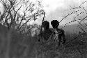 Samuel Putnam negatives, New Guinea; 2 young warriors in the Lokop marsh