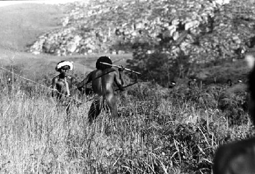 Samuel Putnam negatives, New Guinea; 2 enemies with a long lens