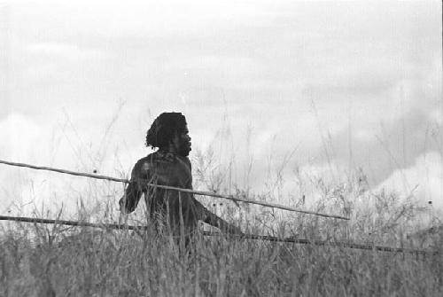 Samuel Putnam negatives, New Guinea; spearman with 2 spears