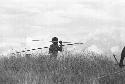 Samuel Putnam negatives, New Guinea; spearman with 2 spears