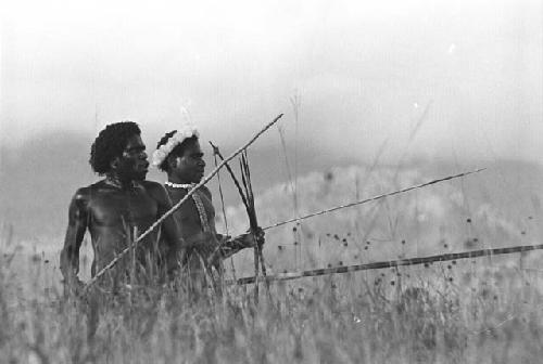 Samuel Putnam negatives, New Guinea; 2 warriors out on the field