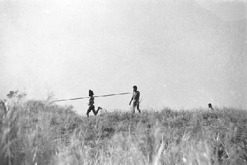 Samuel Putnam negatives, New Guinea; a couple of warriors running