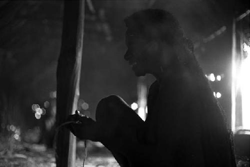 Samuel Putnam negatives, New Guinea; a woman working with her hands