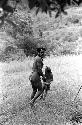 Samuel Putnam negatives, New Guinea; man and child walking near the Anelerak