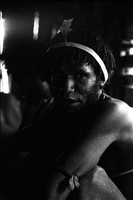 Samuel Putnam negatives, New Guinea; portrait of a man inside a hunu