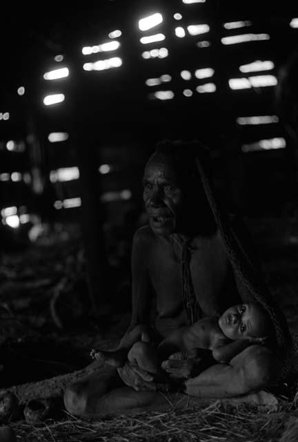 Samuel Putnam negatives, New Guinea; Aneake and the baby; she is talking