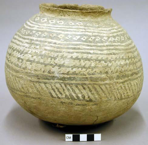 Black on white pottery jar