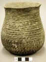 Corrugated pottery jar