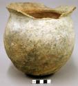 Ceramic jar, sherds missing from rim, fireclouded buff, spalled base