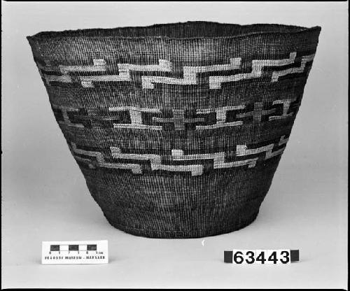 Cylindrical basket from unknown collection. Plain twined, false embroidery.