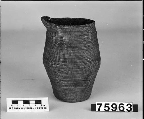 Pitcher-shaped basket from unknown collection. Plain twined.