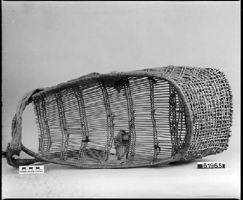 Basket cradle, gift of L.H. Farlow.