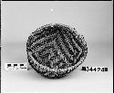 Reproduction of a twilled ring basket with ornamental rim-braid. Original is from Mesa Verde, Pueblo III period and is now located in the Colorado State Historical Society. Made by E.H. Morris, 1941. See Morris and Bugh, "Anasazi Basketry."