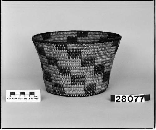 One small basket with black checkered designs