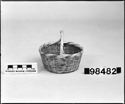 Handled basket, provenance unknown; purchased by G. Nicholson.