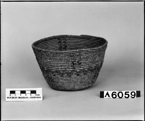 Basket found in north wall of an isolated mesa, 10 miles below Rock Point. Moss Expedition of 1925, "general diggings."