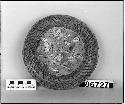 Covered grass basket, gift of E.A. Atwood.