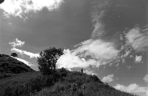 Samuel Putnam negatives, New Guinea; a man sits on the Anelerak