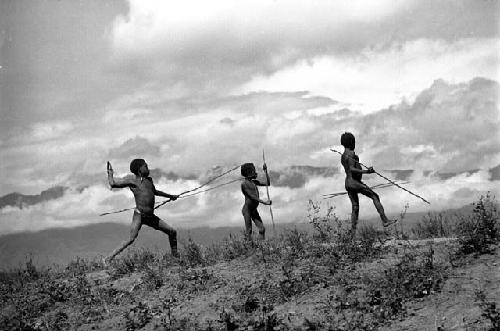 Samuel Putnam negatives, New Guinea; Isili about to throw a hoop